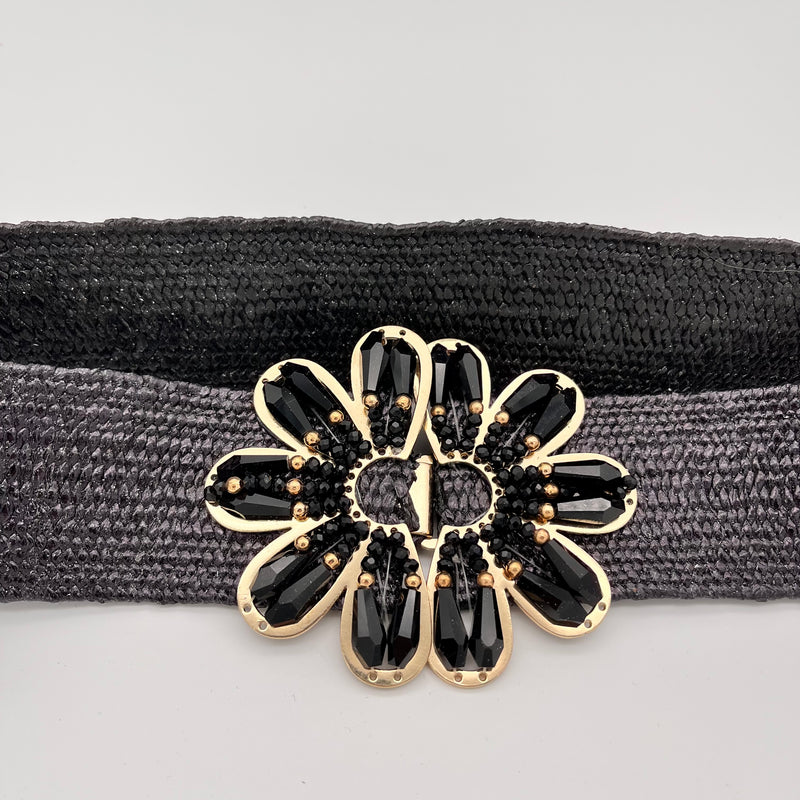 Elastischer Gürtel mit Blumenverschluss in Schwarz und Gold